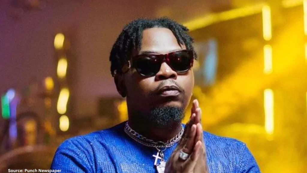 Olamide's Classy Clapback: Rapper Responds to Fan's Criticism with Love and Healing