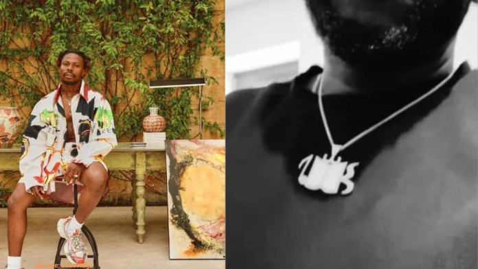 Asake Gifts Diamond Chains to Team, Fans Draw Comparisons to Davido